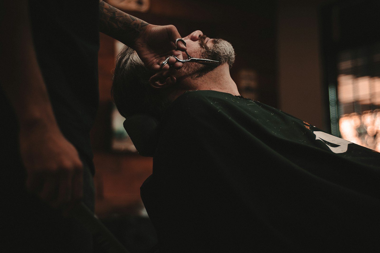 A barber giving a sharp fresh cut